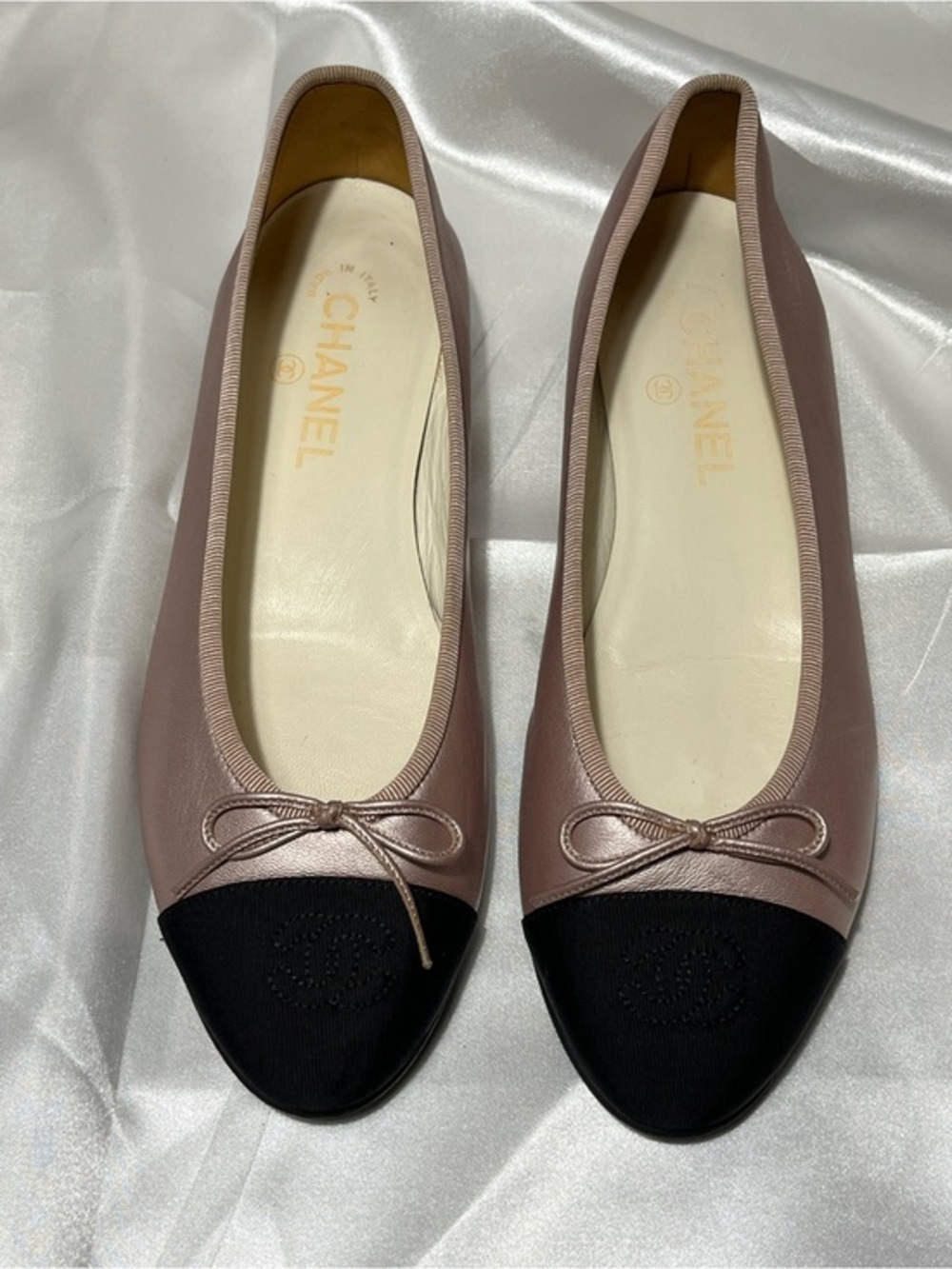 CHANEL Pink and Black Leather Cap-Toe Ballet Flats